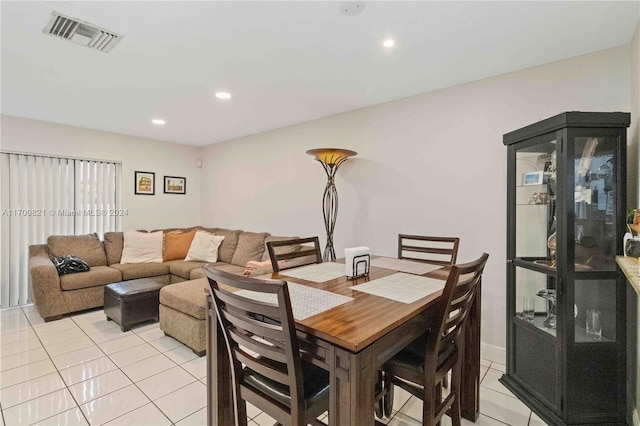 dining room with light tile patterned flooring