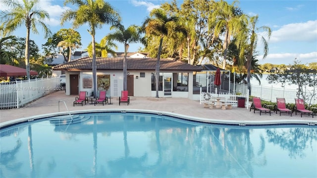 view of pool featuring a patio area