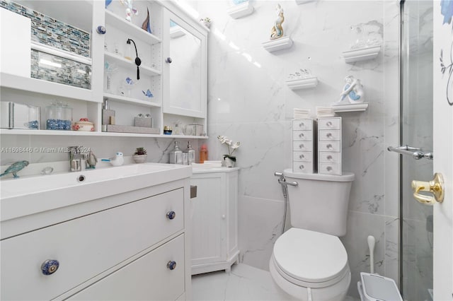 bathroom featuring walk in shower, vanity, tile walls, and toilet