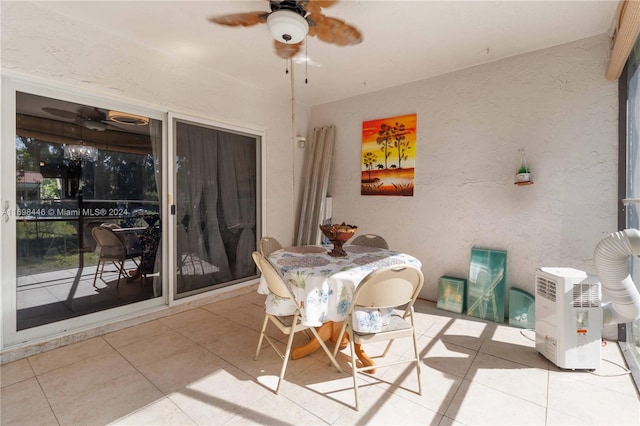 dining space featuring tile patterned floors