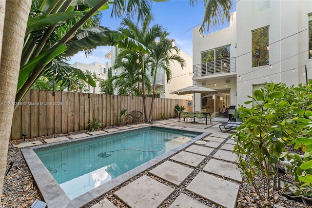 view of pool featuring a patio area