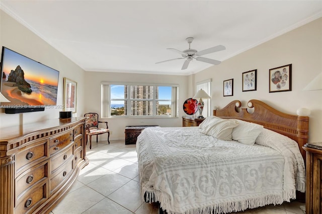 bedroom with ceiling fan, crown molding, and light tile patterned flooring