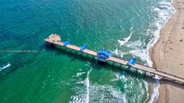 aerial view featuring a water view and a view of the beach