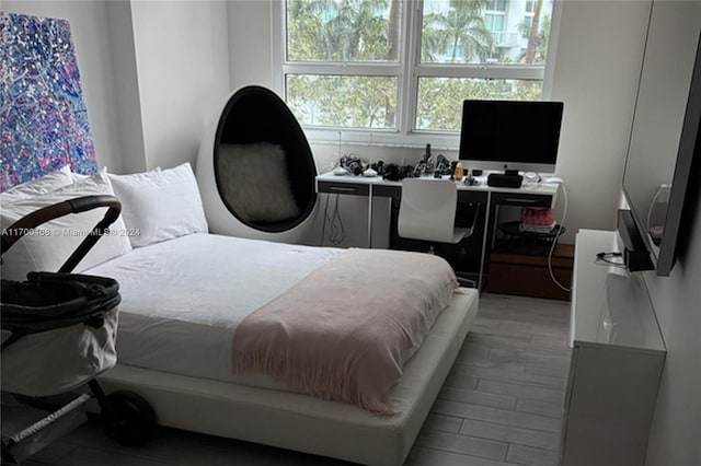 bedroom featuring light hardwood / wood-style floors