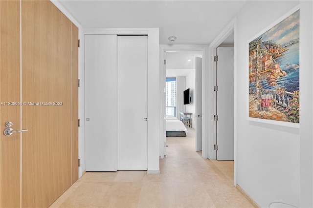 15701 Collins Ave Unit 703, Sunny Isles Beach, FL 33160 - corridor featuring baseboards
