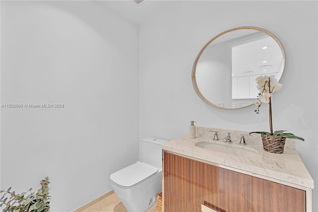 15701 Collins Ave Unit 703, Sunny Isles Beach, FL 33160 - half bathroom featuring vanity and toilet