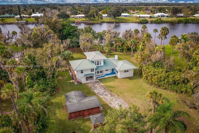 drone / aerial view with a water view