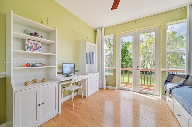 interior space featuring french doors, light wood-type flooring, and ceiling fan