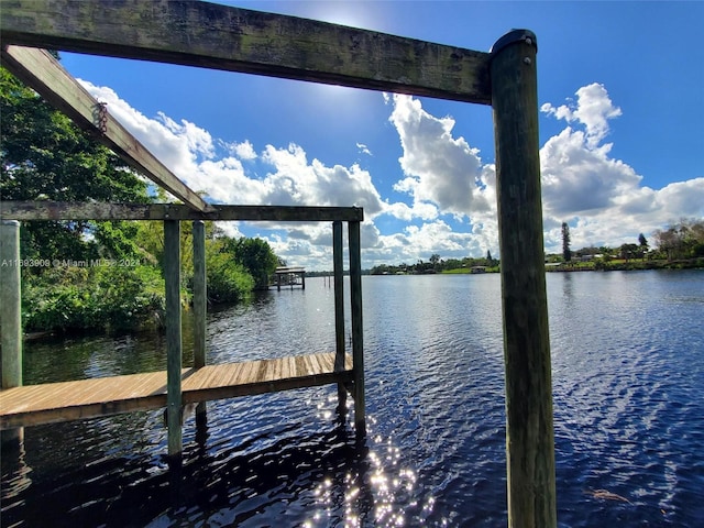 view of dock with a water view