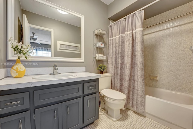 full bathroom featuring shower / tub combo, tile patterned floors, vanity, ceiling fan, and toilet