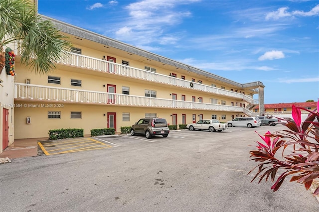 4451 NW 16th St Unit K204, Lauderhill, FL 33313 - view of property featuring uncovered parking
