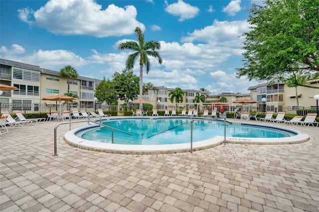 view of pool featuring a patio