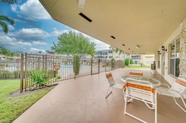 4451 NW 16th St Unit K204, Lauderhill, FL 33313 - view of patio featuring a wall mounted air conditioner
