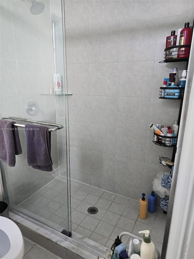 bathroom featuring tile patterned floors and walk in shower