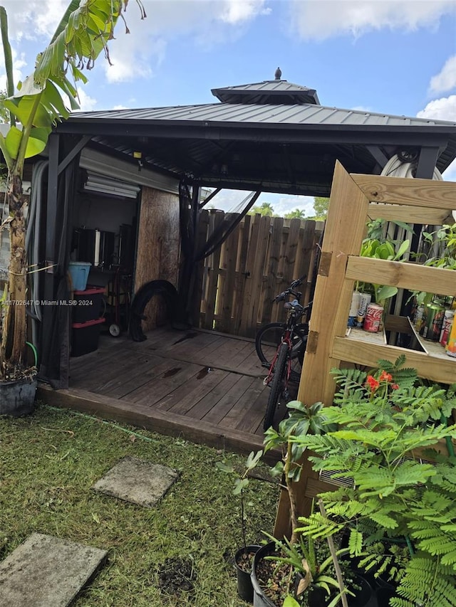 wooden terrace with a gazebo