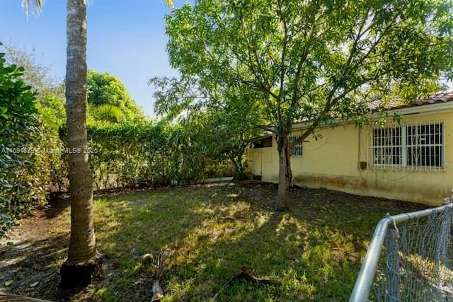 view of yard with fence