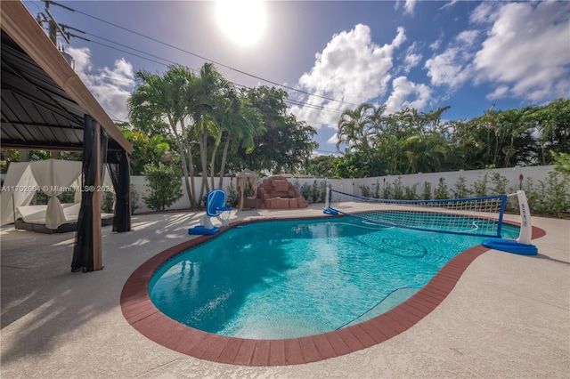 view of pool featuring a patio area