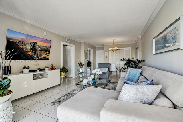 living room featuring a textured ceiling, an inviting chandelier, crown molding, and light tile patterned flooring