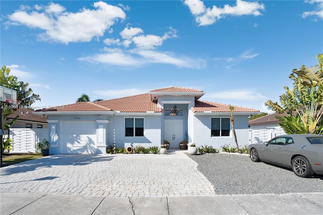 view of front of property featuring a garage