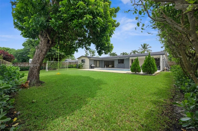 view of yard with a patio area