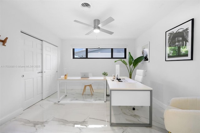 office area with ceiling fan