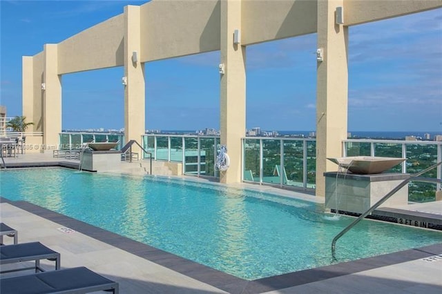 view of pool featuring a patio area