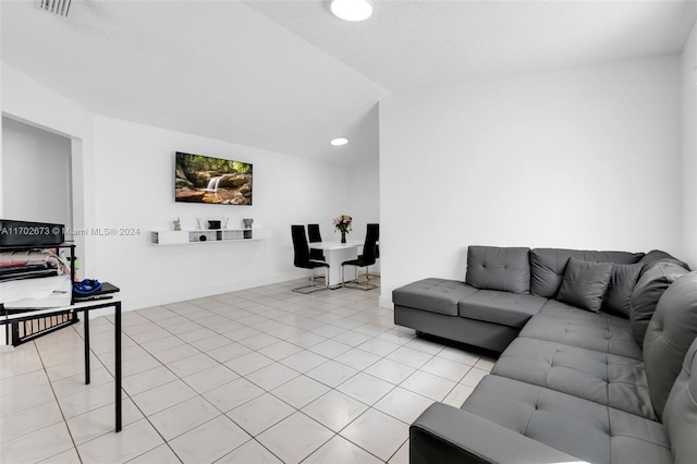 living room featuring light tile patterned flooring