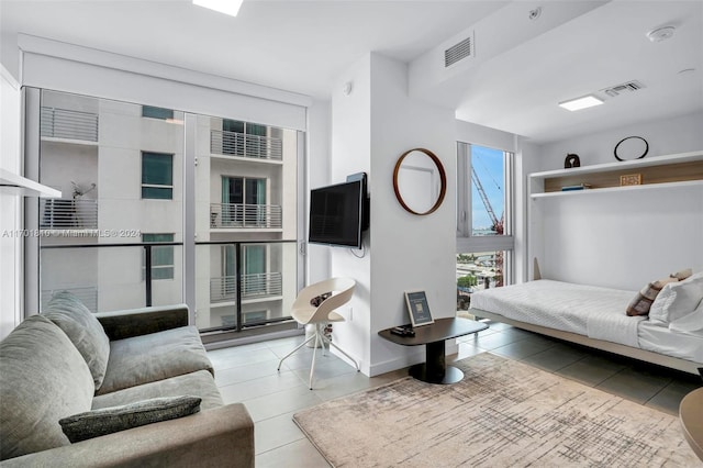 living room featuring light tile patterned flooring