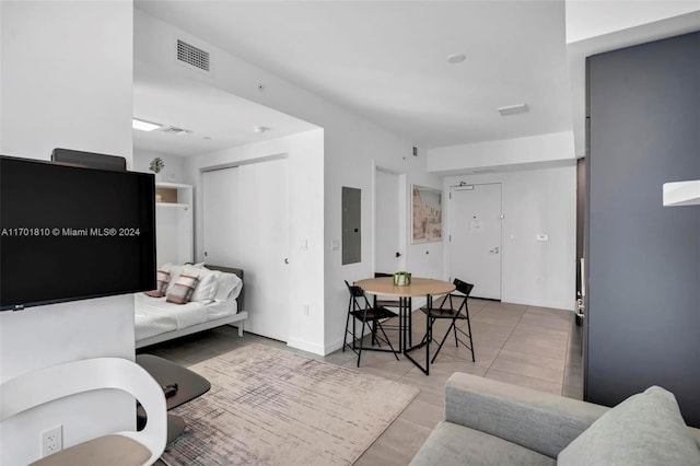 tiled living room featuring electric panel