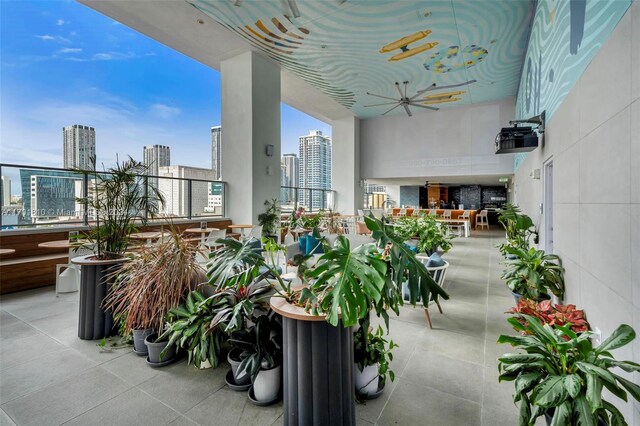 balcony featuring ceiling fan