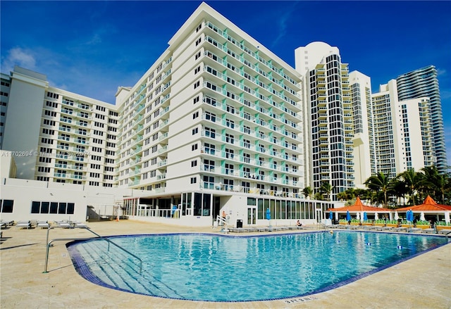 view of swimming pool featuring a patio