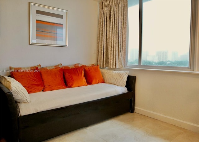 19201 Collins Ave Unit 726, Sunny Isles Beach, FL 33160 - living area with baseboards and light tile patterned floors