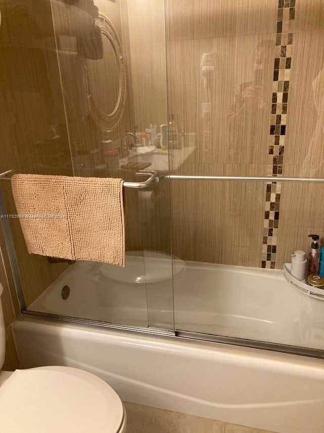19201 Collins Ave Unit 726, Sunny Isles Beach, FL 33160 - bathroom featuring toilet and enclosed tub / shower combo