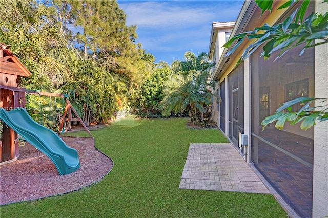 view of yard with a playground