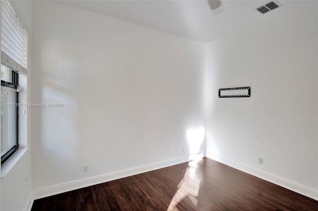 empty room featuring hardwood / wood-style flooring