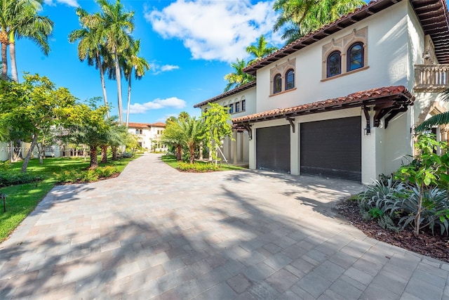 view of property exterior with a garage