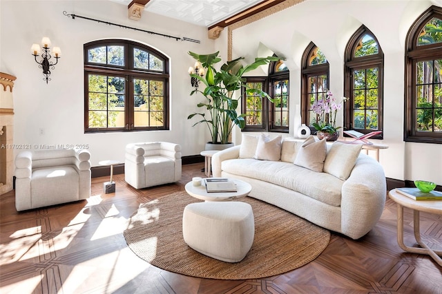 living room with a wealth of natural light and parquet floors