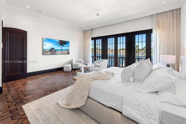 bedroom with crown molding, french doors, and access to outside