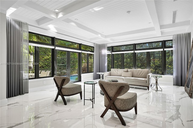 sunroom with french doors, beamed ceiling, and plenty of natural light