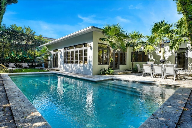 view of pool with a patio