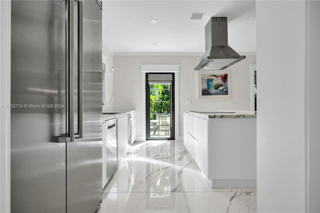 kitchen with island range hood, crown molding, and high end refrigerator