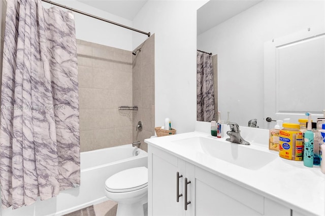 full bathroom featuring vanity, toilet, and shower / bathtub combination with curtain