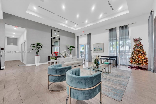 living room with a raised ceiling