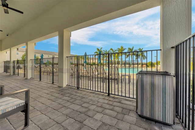 view of patio / terrace featuring ceiling fan