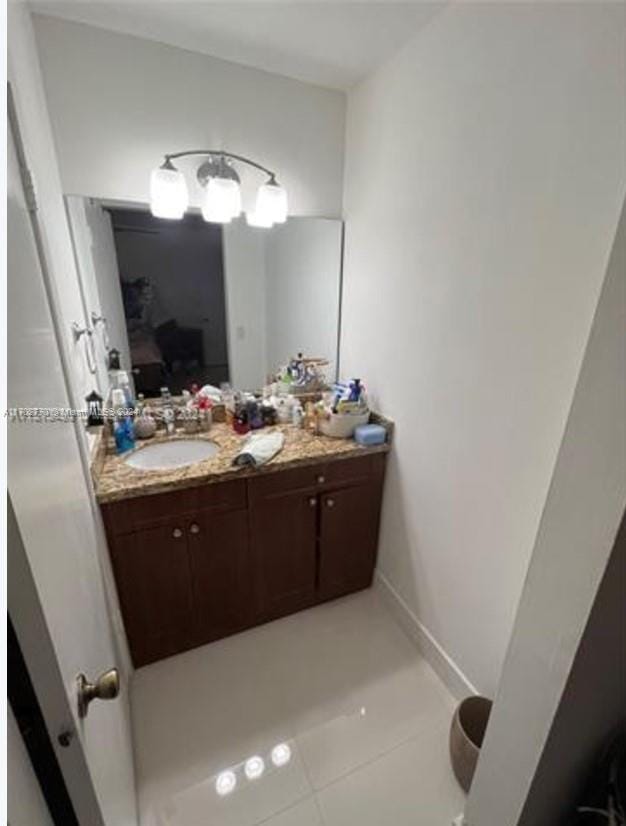 bathroom with vanity and tile patterned floors