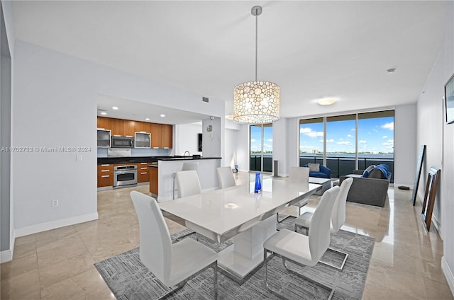 dining area with floor to ceiling windows