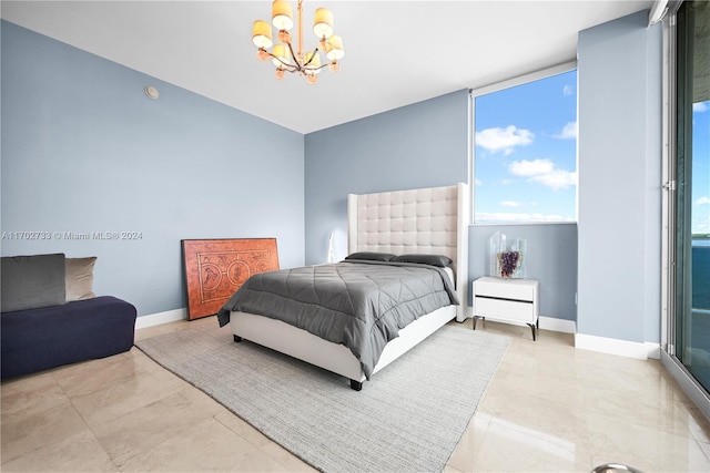 bedroom with expansive windows and a notable chandelier