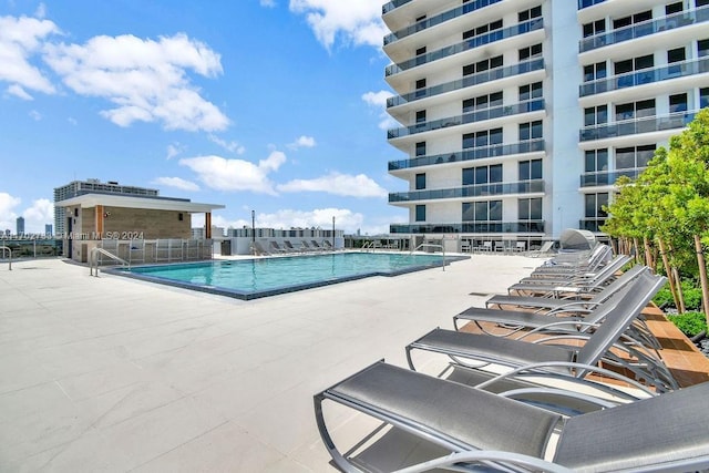 view of pool featuring a patio