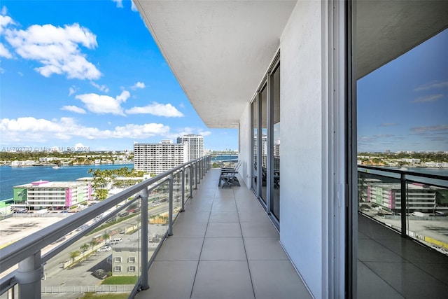 balcony featuring a water view