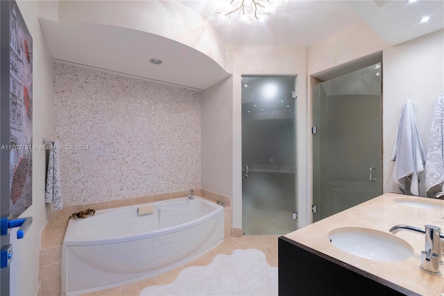 bathroom featuring separate shower and tub, tile patterned flooring, and vanity